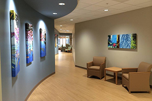 Art lines the walls at the Cowell Family Cancer Center