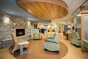 The infusion suite at the Cowell Family Cancer Center includes a fireplace