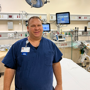 Male ER nurse in emergency department room