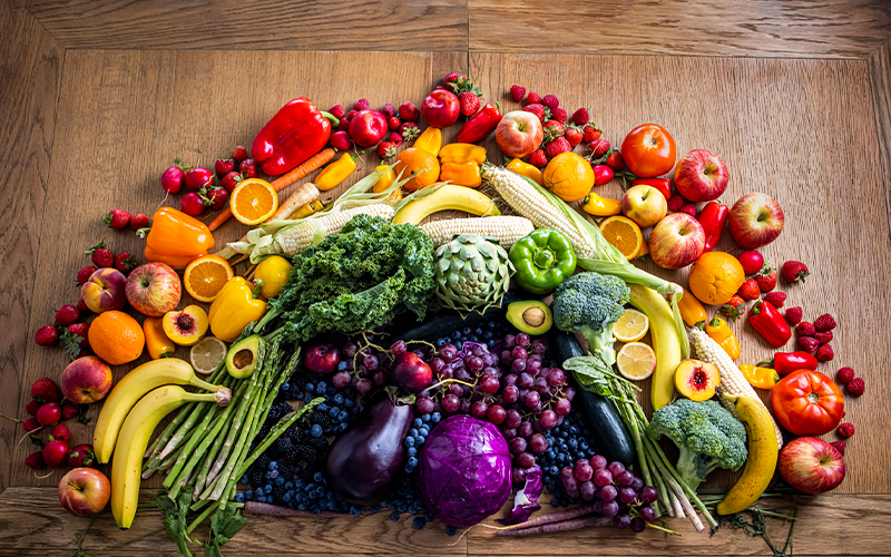 Fruit and vegetables arranged in a rainbow