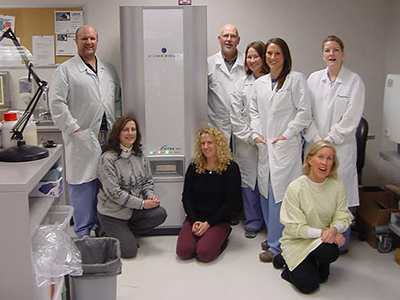 Munson Medical Center staff with new microbiology lab equipment